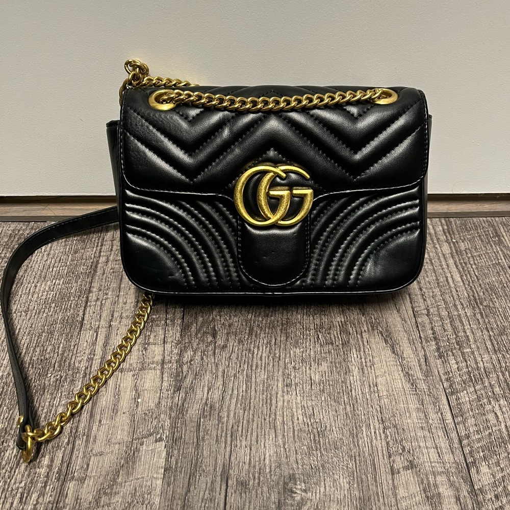 Black crossbody handbag.